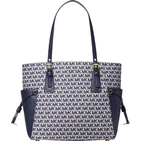 michael michael kors east-west signature tote|voyager east west tote.